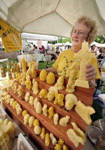 Rosemary Gowdy, president of Valley View Acres in Westfield, displays some of her besswax artwork during a craft show in 2010. Gowdy's farm features fresh honey and honey related products from the several thousand bees that reside on the property. (File photo by Frederick Gore)