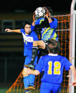 Gateway's Josh Baillargeon, left, leads one of several attacks as Hopkins goalie Ben Pitta makes the save. (Photo by Frederick Gore)