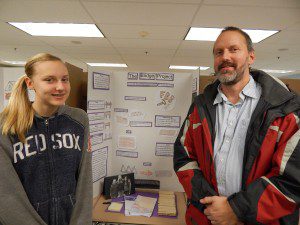 Student Megan Wright and her dad visit Megan’s engineering project. (Photo submitted)