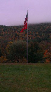 RUSSELL - Vicki Benford's son lives in Russell is a Veteran of the Marine Corps.  His name is Robert DeCoteau III.  He bought his house after serving five years and two tours to Iraq.  Last month he put up this 25' flag pole in his back yard that over looks the mountains along Rte 20.  He lives on Fairview Ave.  He proudly displays the United States Flag and the Marine Corps flag.  (Photo submitted)