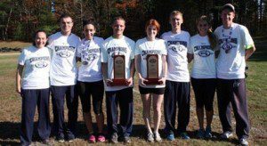 Westfield State University seniors display the championship hardware. Left to right are: Kristina Duplisea, Ryan Doherty, Andrea Domings, Mike Kelleher, Caitlin Ryan, Sean Comerford, Kelsey Garvey, Cam Fairbanks. (Photo by Olivia Marshall)
