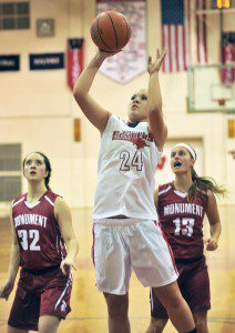 Westfield's Keri Paton, center, takes a jump shot during Thursday night's game against Monument Mountain. Westfield won 56-48. (Photo by Frederick Gore)