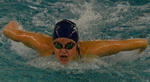 Holly Arel placed first in the 50 butterfly and the 100 butterfly, (Photo by Mickey Curtis)