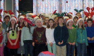 Students in Cindy Stokowski’s third grade class from Chester Elementary School delivered over 400 items for the Soldiers Home in Holyoke. They sang to the soldiers when they made their delivery. (Photo submitted)