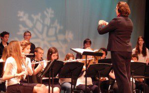 Band Director Beth Guertin leads the combined band/choral finale at the Annual Sr. Citizen Brunch/Concert. (Photo submitted)