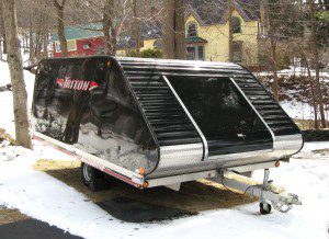 A snowmobile trailer containing two snow machines was damaged early Monday morning when thieves apparently connected the trailer’s safety chains to a vehicle and jerked it free from the tree it was chained to and stole it.