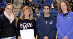 From left to right are: Kelsey Carpenter, Student-Athlete Advisory Board member; Lauri Scott-Smith, program coordinator of the Springfield area Cancer House of Hope; Zack Madera, Student-Athlete Advisory Board member; and Nancy Bals, Westfield State associate athletics director.(Courtesy of Westfield State Sports Information Department)