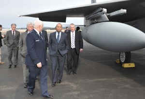 Major General L. Scott Rice, foreground, of the Massachusetts Air National Guard, provided a close-up tour of an F-15 aircraft during a visit yesterday by U.S. Congressman Richard E. Neal, far left, Richard K. Sullivan Jr., secretary Executive Office of Energy and Environmental Affairs, second from left, Gov. Deval Patrick, second from right, and Westfield Mayor Daniel Knapik, right, during a ribbon cutting ceremony for the grand opening of a new 9,000-foot runway at Barnes Regional Airport. (Photo by Frederick Gore)