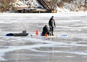 Ice fishermen stake out their favorite part of Congamond Lake in Southwick yesterday. (Photo by Frederick Gore)