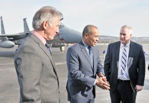 Gov. Deval Patrick, center, is joined by U.S. Congressman Richard E. Neal, left, and Westfield Mayor Daniel Knapik, right, during a ribbon cutting ceremony for a new 9,000-foot runway at Barnes Regional Airport Friday. (Photo by Frederick Gore)