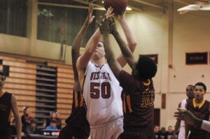 Westfield's Jason Howard (50) attempts to split the Chicopee defense Thursday night. (Photo by Chris Putz)