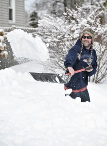 Joe Albano of Southwick shovels his driveway After last Thursday's snowstorm. (File photo by Frederick Gore)