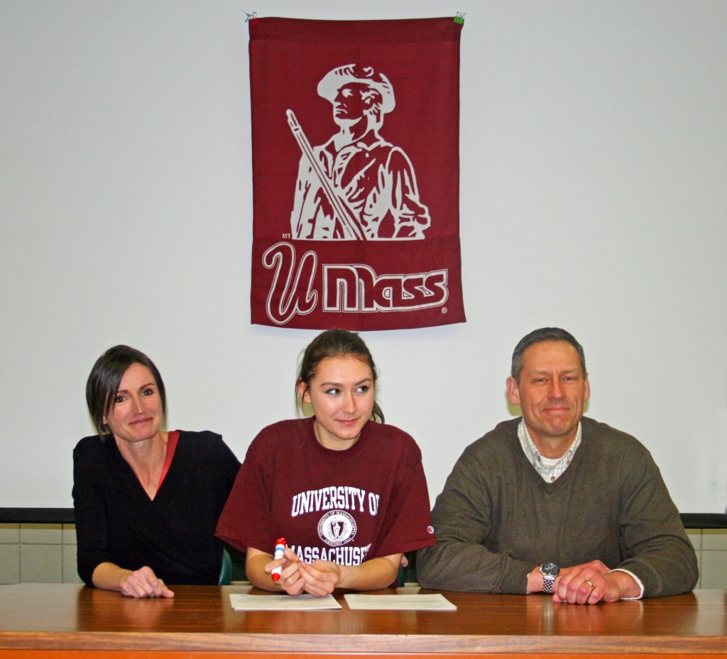 Westfield High School senior Allyson Morin (center), seated alongside her mother and father, signed her Letter of Intent recently to attend the University of Massachusetts to run track all three seasons. She will join former Bombers’ runners Blake Croteau and Tim Dostie, who are finishing their freshman seasons with the Minutemen.