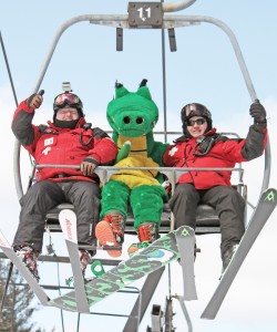 The Gateway Regional High School mascot is escorted to the top of the Berkshire East Ski Resort by two ski instructors during the Western Mass ski championships Tuesday. (Photo by Kevin Green)