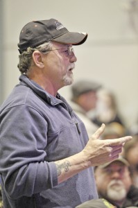 Southwick resident Russ Pike speaks during an informational meeting on the reopening of the Motocross 338 racetrack at the Southwick Town Hall last night. (Photo by Frederick Gore)