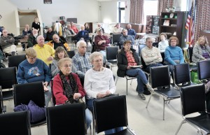 Audience members listen to state representative candidates Dan Allie and John Velis during a Meet the Candidates hour at the Westfield Senior Center yesterday. (Photo by Frederick Gore)