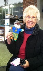 Janice Phillips of Westfield poses with her Flat Stanley cutout which she received from her great-granddaughter last week (Photo by Peter Francis)