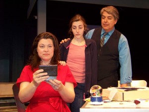 Actors, from left, Sue Dziura, Emery Henderson and Tom Nunes are pictured in a scene from "Next to Normal" at West Springfield's Majestic Theater. (Photo courtesy of Lee Chambers.)