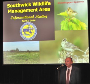 Robert Eblinger, deputy director of the Massachusetts Division of Fisheries and Wildlife, speaks last night at a meeting in Town Hall to explain increased enforcement efforts targeting ATV users on protected wildlife habitats. (Photo by Carl E. Hartdegen)