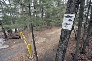 A large steel gate and sign identify the wildlife property as protected land and forbid the use of motorized vehicles.The property is under control of the Massachusetts Division of Fisheries and Wildlife. (Photo by Frederick Gore)