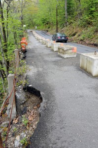 Residents and commuters using Carrington Road in Russell have been inconvenienced for the past several years after a large portion of the roadway gave way causing the road to become one lane in the washout area. Funding for the repairs has been an ongoing issue. (File photo by Frederick Gore)