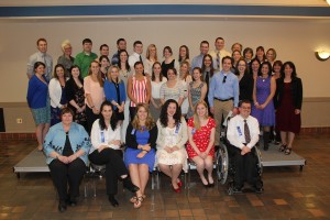 Dr. Susan Dutch, bottom row, far left, poses with Psi Chi members at the 2014 Psi Chi Induction Ceremony. (Photo submitted)