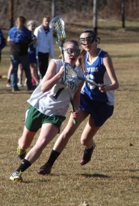 St. Mary's Andrea Watson sprints past a defender. (Photo by Chris Putz)
