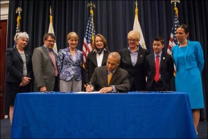 Governor Patrick signs H. 3909, “An Act Relative to Bullying in Schools.” (Photo: Sam Hooper/ Governor's Office)