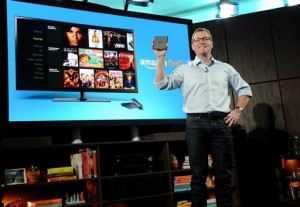 Amazon's Peter Larsen introduces Amazon Fire TV during a press conference in New York on Wednesday, April 2. At $99, Amazon claims Fire TV is the easiest way to watch Netflix, Prime Instant Video, Hulu Plus, WatchESPN, and more on a big-screen TV. (Photo by Diane Bondareff/Invision for Amazon/AP Images)