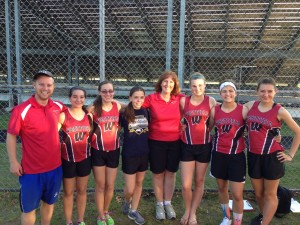 The Westfield High School girls' track and field seniors are, from left to right, Tori Plourde, Rachel Huntley, Nicole Chartier, Emily Ann Andrews, Chrissy Seymour, and Ally Morin. Bombers' head coach Linda Rowbotham stands in the middle, and assistant coach Ben Hatch is standing at far left. Seniors Keri Paton and Jenna Rothermel are missing from the photo. (Picture courtesy of assistant coach Michael Rowbotham) 