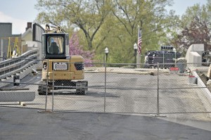 Contractors applied the new pavement on the Pochassic Street Bridge last month. The bridge is scheduled to open Friday. (File photo by Frederick Gore)