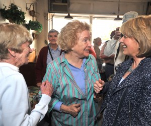 Massachusetts Attorney General Martha Coakley, a candidate for governor in the upcoming Democratic primary, shares a laugh with Westfield resident Carole Cummings and Norma Hill of the city’s Democratic City Committee during a campaign stop Saturday at Leo’s Gallery Deli in downtown Westfield. (Photo by Carl E. Hartdegen)
