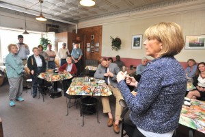 Massachusetts Attorney General Martha Coakley addresses city Democrats who gathered at Leo’s Gallery Deli Saturday morning to meet or greet the candidate seeking the Democratic party’s nomination to run for governor. (Photo by Carl E. Hartdegen)