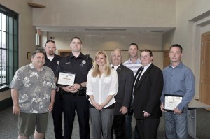 Southwick Police Chief David Ricardi, fourth from right, along with selectmen Joe Deedy, left, Tracy Cesan, center, and Russell Fox, second from right, joins Southwick police officers, Michael Westcott, second from left, and David Massai, third from left, who received a "Life Saving Recognition Award", along with Southwick residents Brad Emelmann, third from right, and Sean Langan, right, who received a "Certificate of Recognition for Outstanding Citizen" during a special award ceremony in the Southwick Town Hall last night. The four were recognized by the selectmen and police chief for their heroic actions in helping to save the life of John Grunwald who was involved in a serious accident April 1, 2014 on Mort Vining Road in Southwick. (Photo by Frederick Gore/www.thewestfieldnews.smugmug.com)