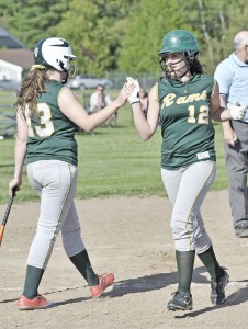 Southwick's Tori Richburg, left, congratulates Alyssa Kelleher after scoring against visiting Ware. (Photo by Frederick Gore)