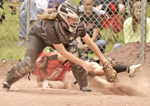 Westfield's Maddy Atkocaitis, rear, beats the tag of a Pittsfield catcher. (Photo by Frederick Gore)