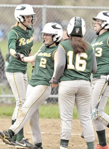 Southwick's Samantha Burzynski, center #2, is congratulated by her teammates during Friday's game against Palmer. Burzynski claimed the 12th run for the mercy ruling ending the game. (Photo by Frederick Gore/www.thewestfieldnews.smugmug.com)