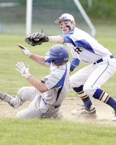 Gateway second baseman Willis Pollard, right, looks for the out on a Granby runner. The baserunner was ruled "safe." (Photo by Frederick Gore)