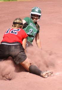 Westfield third baseman Maddy Atkocaitis attempts to tag out Minnechaug's Sam Mariani (21). (Photo by Chris Putz)