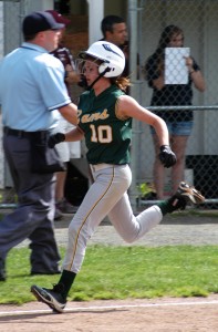 Southwick-Tolland Regional High School lead-off batter Sydney Rogers (10) scores on a Sam Burzynski double in the top of the first inning against Easthampton in a Western Massachusetts Division 2 softball quarterfinal game Thursday at Nonotuck Park. (Photo by Chris Putz)