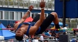 Travon Godette clears a personal best of 6-6 3/4 in the high jump. (Photo by Mickey Curtis)