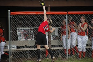 Westfield third baseman Maddy Atkocaitis goes up against the fence to track down a foul ball for an out in a May 23 regular season game.