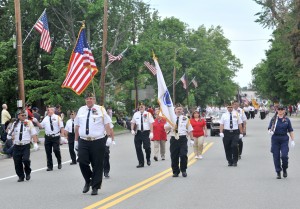 A delegation from American Legion Post 124 marches in the Westfield Memorial Day parade yesterday. (Photo © 2014 Carl E. Hartdegen)