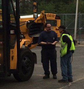 MassDOT Inspector Carl Thiemer goes over several of the 192 items inspected on every school bus across the state. (Photo by Hope E. Tremblay)