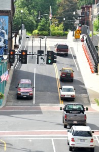 Traffic flows up Drugstore Hill to the newly reopened Pochassic Street bridge Friday afternoon. (Photo by Carl E. Hartdegen) 