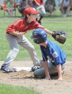 The Westfield Little League North and South Major All-Stars collide during a 2013 playoff game. Tournament season is now under way in the Whip City.