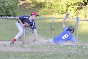 Westfield's Brad Alvordleft, left, makes the out on Gateway baserunner Josh Webster during last night's Senior Little League game. (Photo by Frederick Gore/www.thewestfieldnews.smugmug.com)