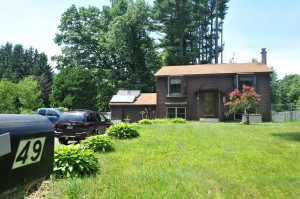 Southwick police executed a warrant Friday at 49 Tannery Road and found a marijuana growing operation before arresting the resident, XXXXXXX. (Photo ©2014 Carl E. Hartdegen)