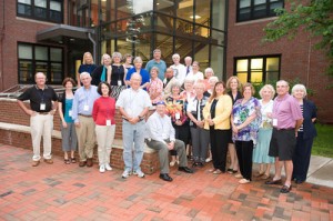 Westfield State alumni pose in front of Scanlon Hall during the 2011 Reunion Weekend celebration. (Photo submitted)