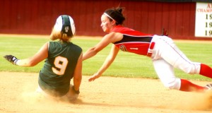Southwick's Katelyn Sylvia attempts to beat the tag of the Hamsphire infielder. (Photo by Chris Putz)